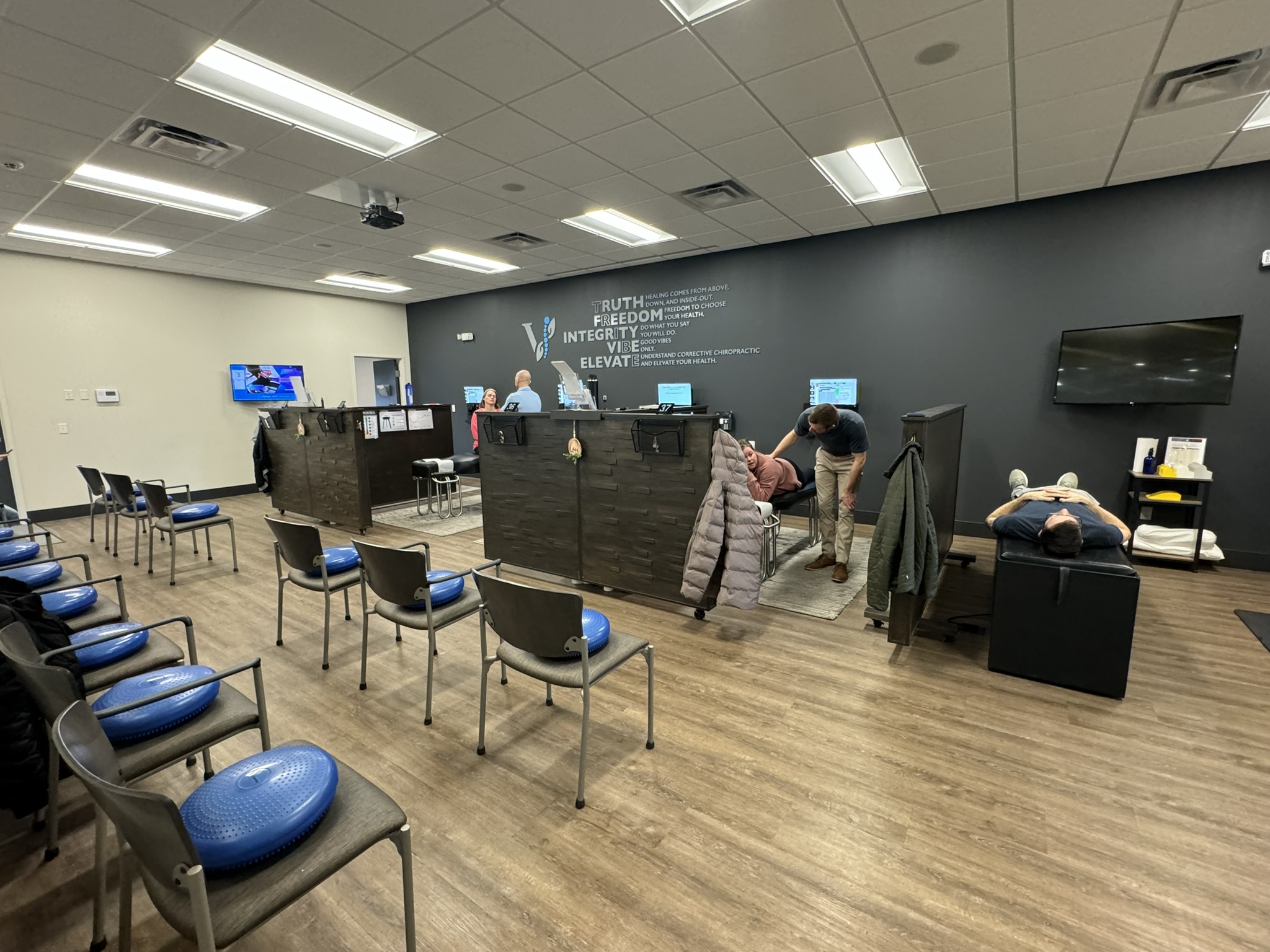 Patient arriving at a chiropractic clinic in Fishers, IN for a scoliosis evaluation appointment.