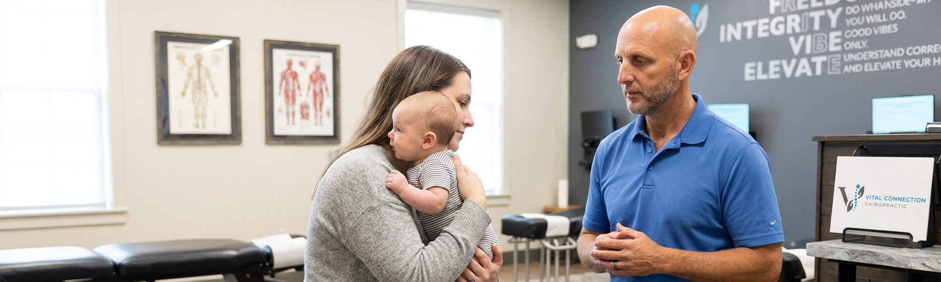 Pediatric chiropractor observing infant neck mobility in Fishers, IN, pediatric chiropractic care, pediatric chiropractor near me, chiropractic care for children, how does pediatric chiropractic care work,