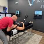 patient discussing relief migraine headache symptoms in Fishers IN chiropractic clinic., relief migraine headache, relief migraine headaches,